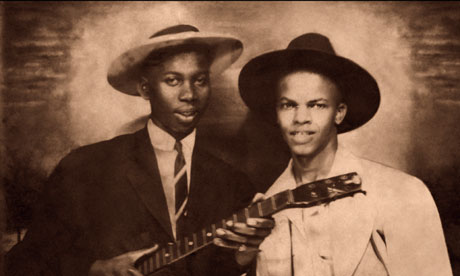 The man on the left has been identified as Robert Johnson, the legendary blues singer and guitarist.
